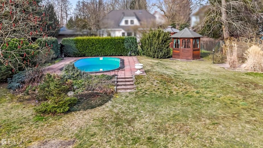 Charmantes Einfamilienhaus mit Baulandreserve – Detailbild Garten