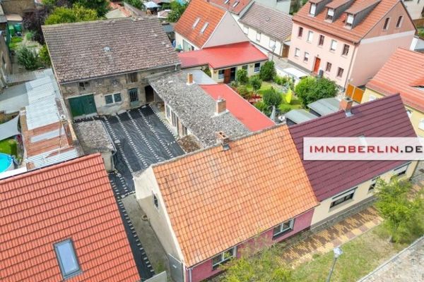IMMOBERLIN.DE - Sanierungsgelegenheit! Haus mit Nebengebäude & Ausbaupotenzial in angenehmer Lage