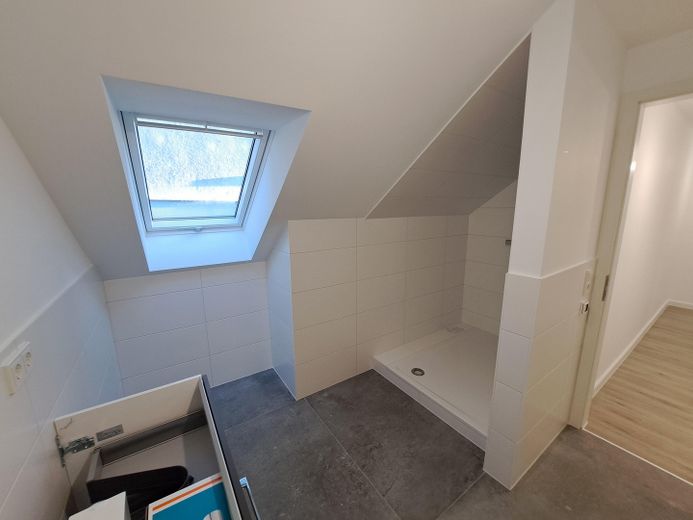 Moderno appartamento mansardato con 2 locali in centro – Bad