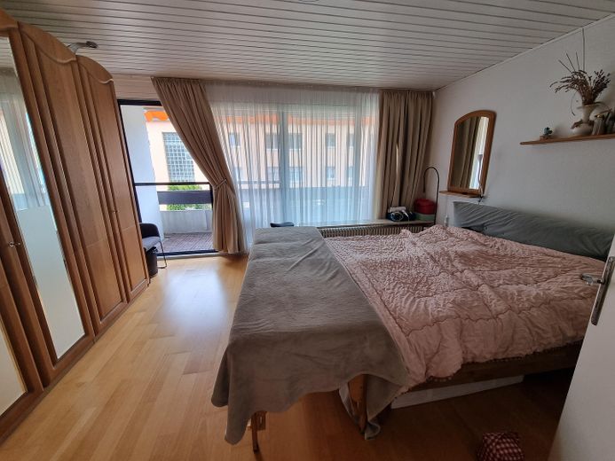 Schlafzimmer mit Balkon