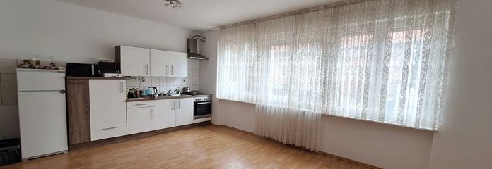 Wohnzimmer mit Küche