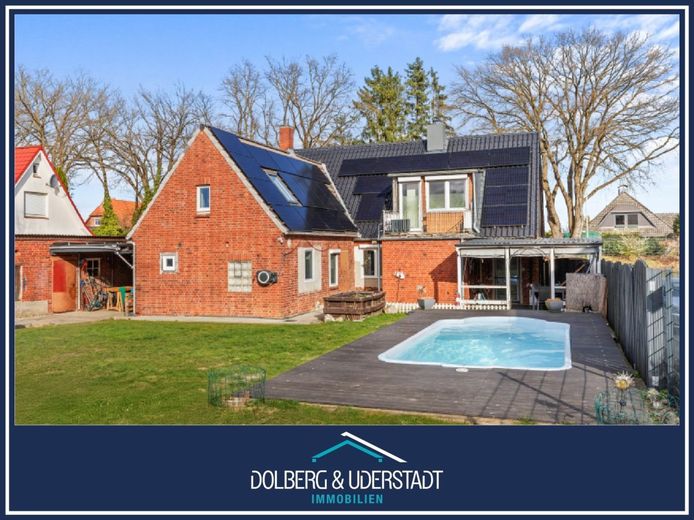 Ein Zuhause zum Ankommen und Wohlfühlen - Mit Gartenparadies und Pool – Titelbild