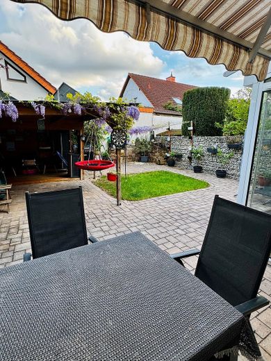 Casa unifamiliare ben tenuta in posizione periferica a Ludwigshafen Ruchheim – Garten