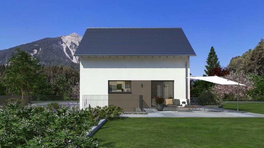 DAS HAUS MIT DEM PLUS AN RAUM – Ansicht Garten