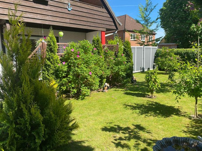 Modernisiertes Einfamilienhaus mit Kamin,Wallbox,bezugsfertig & tollem Wohngefühl – Garten Vorderseite