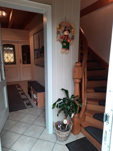 Splendida casa bifamiliare con vista sul lago – Treppe ins OG
