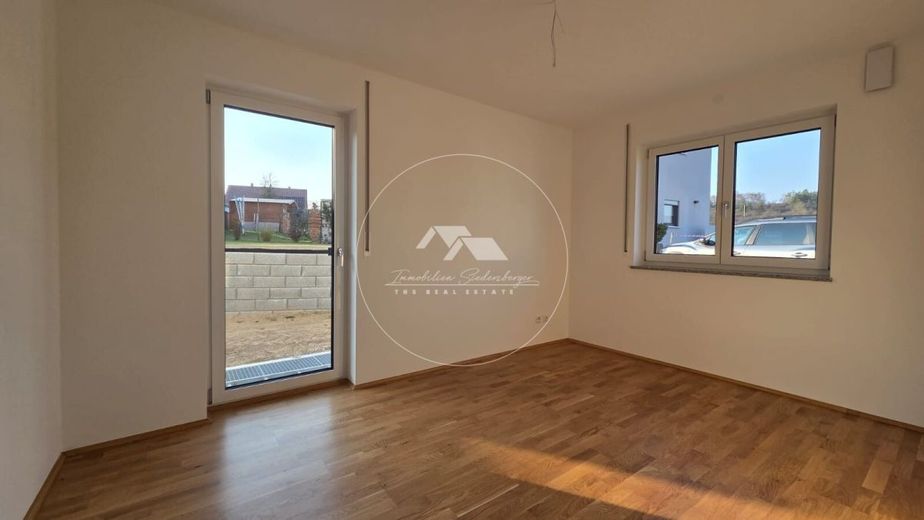 Erstbezug mit Wohlfühlfaktor - Moderne KfW-40-Wohnung im EG und UG  mit Stellplatz &amp; Gartenanteil – Schlafzimmer im Erdgeschoss
