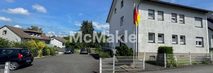 Vollvermietetes Dreifamilienhaus mit Entwicklungspotenzial in begehrter Wohnlage