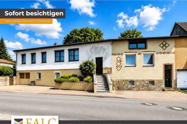 ***Versatile edificio residenziale e commerciale con ampi spazi e un giardino da sogno***