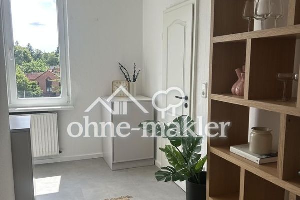 Schöne renovierte 2 Zimmer Wohnung mit Gemeinschaftsgarten