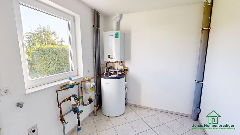 Einfamilienhaus mit Carport und Garten – Foto 8