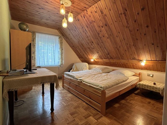 Abitare nel verde ai margini della città patrimonio dell’umanità – Schlafzimmer OG