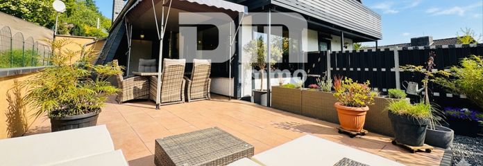 Titel Rückansicht / Terrasse teilüberdacht