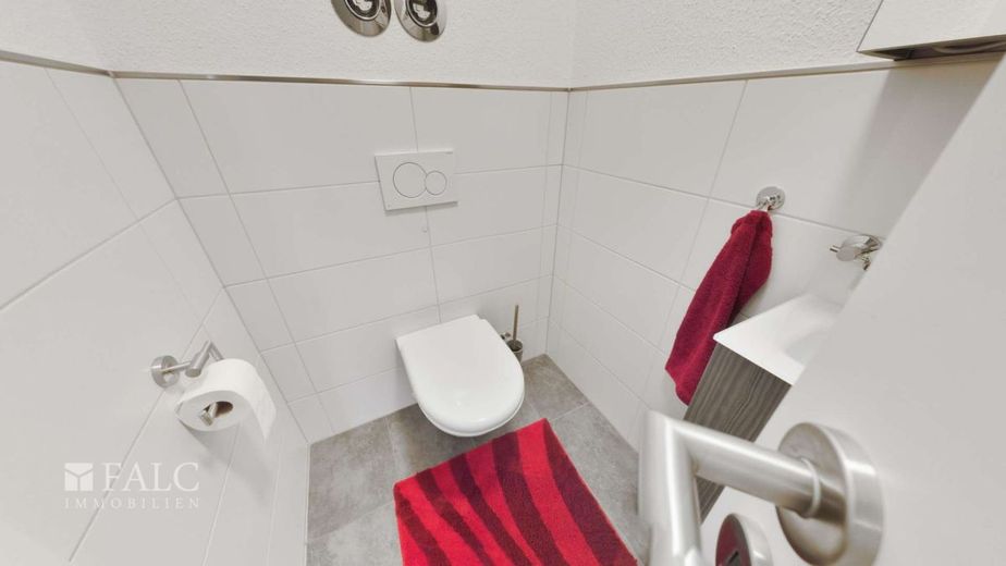 Moderne 4-Zimmer-Wohnung mit Balkon, Aufzug und Tiefgaragenstellplatz – GästeWC___Waschraum