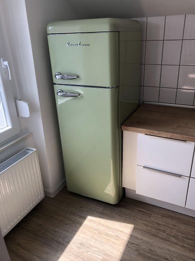 Erstbezug nach Komplettsanierung; schöne DG-Whg. mit EBK in energetisch saniertem Haus – Küche