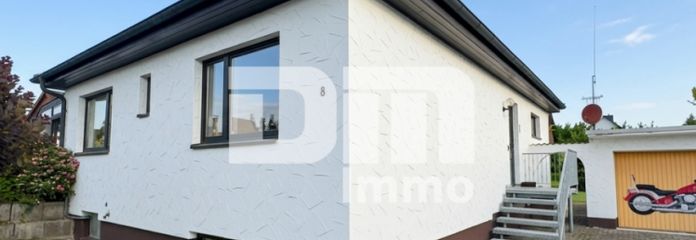 Solider Familien-Bungalow mit großem Potenzial in ruhiger Lage mit Wintergarten und Garage