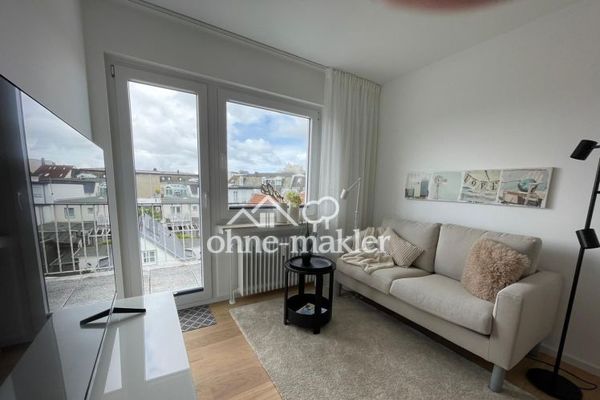 Above the rooftops of Norderney: Stylish 2-room apartment with sunny balcony