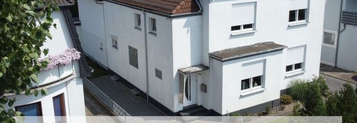 1–2-family house with separate apartment + large garden, garage, shed & potential for attic conversion!