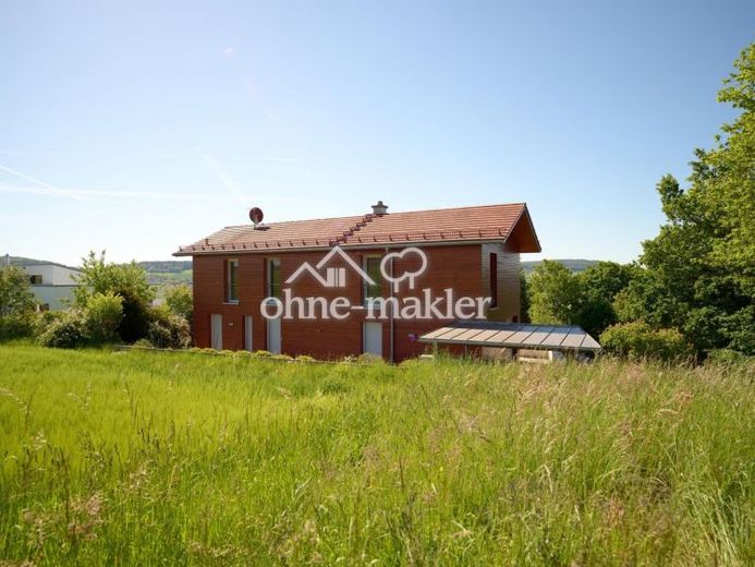 Freistehendes Einfamilienhaus in besonderer Feldrandlage mit großzügigen Terrassenflächen – Foto 1