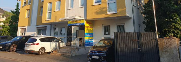 Bestehendes Apartmenthaus mit Baugenehmigung für ein 6-Familienhaus an der Bergstraße