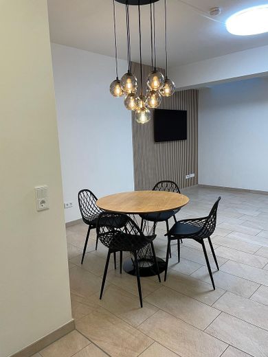 Möblierte 1 Zimmer Wohnung in Unterhaching – Wohnbereich 