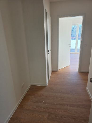 Primera ocupación: moderno apartamento en planta retranqueada con terraza en la azotea y confort residencial energéticamente eficiente – Eingangsbereich