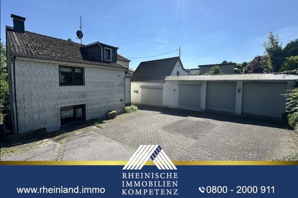 HANDWERKER AUFGEPASST! ZWEIFAMILIENHAUS mit 6 GARAGEN
in RUHIGER LAGE am Landschaftsschutzgebiet
