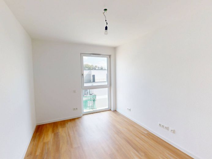 Modern wonen: lichtrijk nieuwbouwappartement met 3 kamers, balkon en inbouwkeuken – Ansicht I: Schlafzimmer II