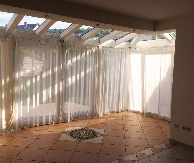 Top-Immobilie für Anleger (Investoren) – Wintergarten/Wohnzimmer innen