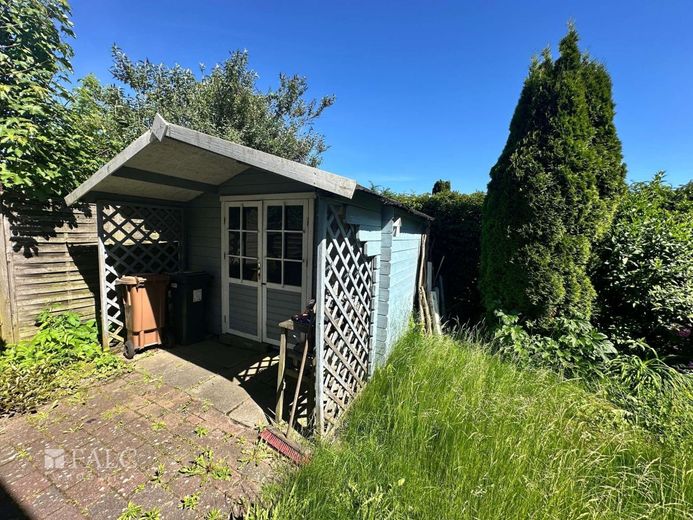 Charmantes Einfamilienhaus mit schönem Ambiente in Grünendeich – Gartenhaus