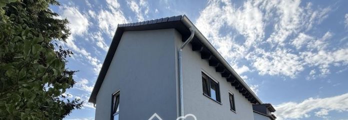 Exklusives Neubau-Dreifamilienhaus in Hanau-Klein-Auheim – Erstbezug mit hochwertiger Ausstattung