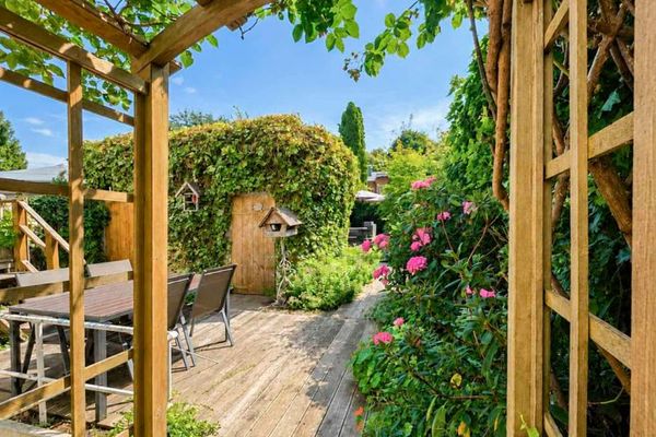 Zeldzaam: beschutte droomtuin ontmoet stijlvol gerenoveerde twee-onder-een-kapwoning uit 1909