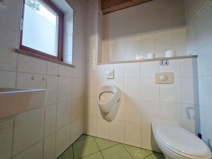Hochwertige Baukunst &amp; nachhaltige Ausstattung - ein Zuhause mit Zukunft – kleines Gäste WC EG