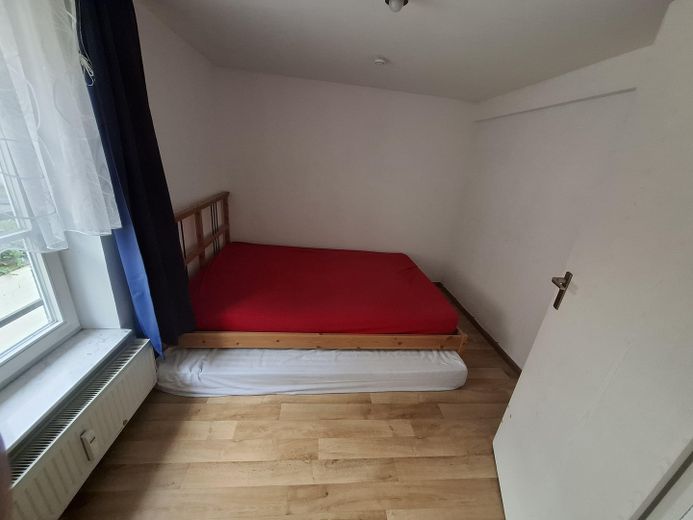 Accogliente appartamento di 2 locali in pieno centro! – Schlafzimmer