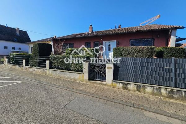 Piękny dom w stylu bungalowu z ogrodem i dużym garażem