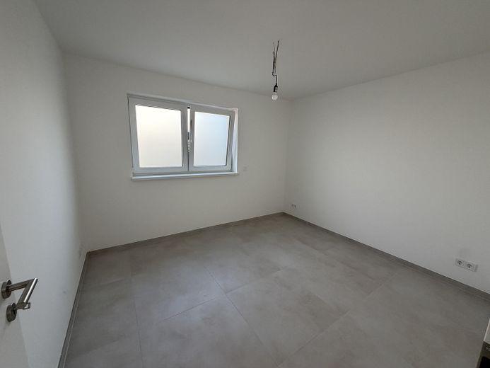 Erstbezug im Neubau – Stilvolle 2-Zimmer-Wohnung mit eigenem Garten und moderner Ausstattung – Schlafzimmer
