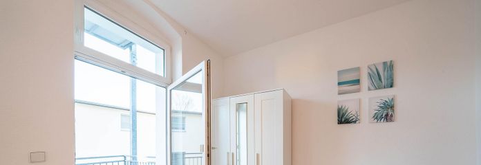 Zimmer mit Balkon