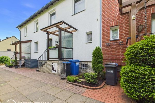 Familienglück auf drei Ebenen – gepflegtes Reihenmittelhaus mit Garten, Terrasse und Garage