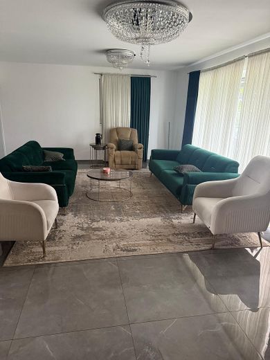 Moderna casa unifamiliare indipendente nel verde – Wohnbereich