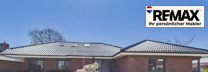 Modernisierter Bungalow mit kleiner Gewerbeeinheit in belebter Lage