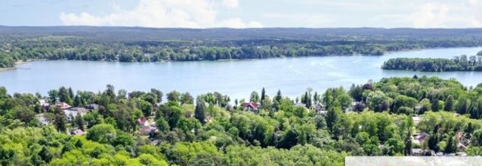 IMMOBERLIN.DE - Bungalow mit Nebengebäude auf naturschönem Grundstück in Südausrichtung