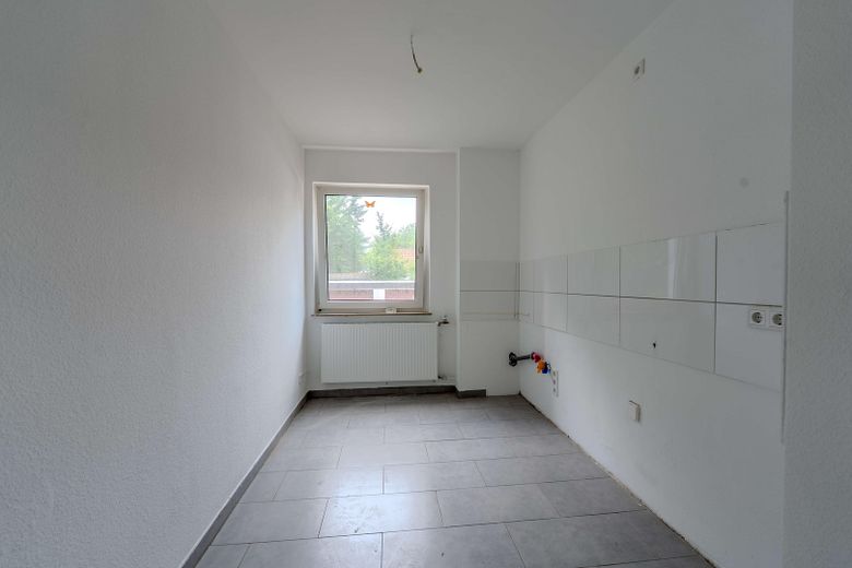 Frisch renovierte 2-Zimmer-Wohnung im Erdgeschoss – Küche