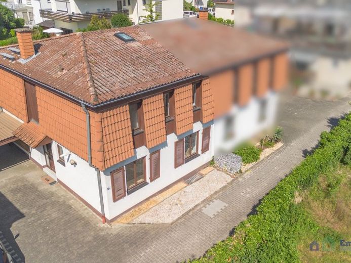 Ihr neues Zuhause in Frei-Weinheim – Doppelhaushälfte mit Garten und Carport – Foto 1