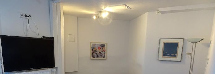 Wohnzimmer mit Schlafsofa