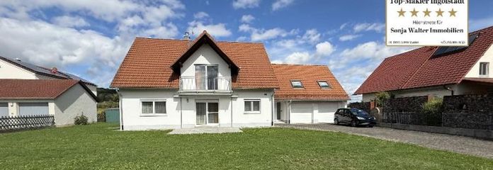 Einzugsbereites Zweifamilienhaus mit Keller, Doppelgarage und Wärmepumpe - Ein Objekt von SOWA Immobilien und Finanzen