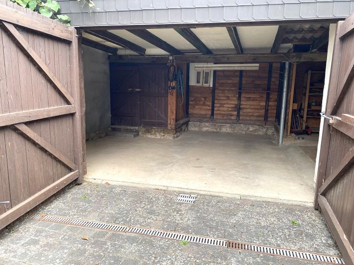 Idyllischer Rückzugsort: Charmantes Bruchsteinhaus mit toskanischem Innenhof – Garage/Projektraum