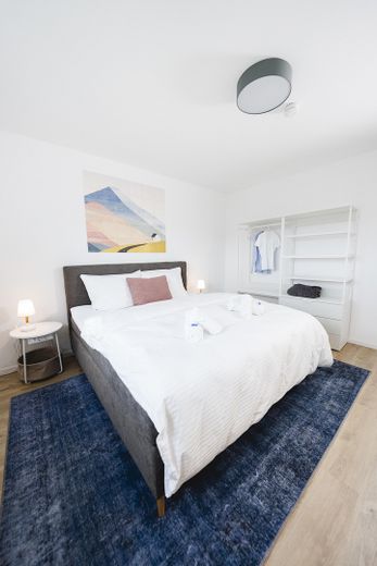 Moderno appartamento di 2 locali nella Südweststadt – Schlafzimmer