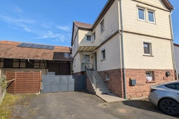 Neuental, vivienda unifamiliar + edificio anexo
