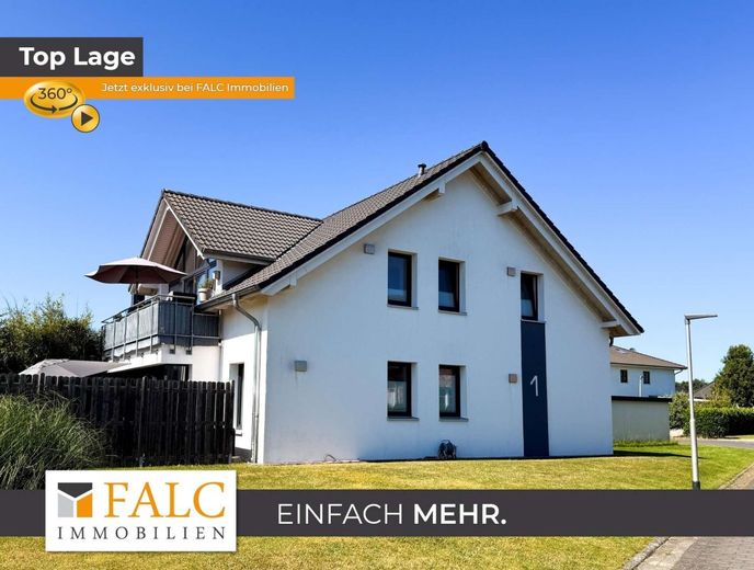 Hell. Offen. Energieeffizient. KfW-40-Wohnung mit sonniger Terrasse und Garage – Außenansicht