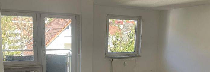 Wohnzimmer mit Balkon